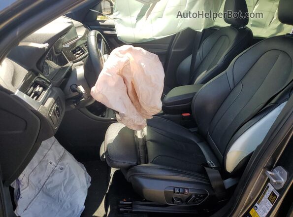 WBXHT3C39J5K22593 2018 BMW X1 Gray წინა სალონის ხედი
