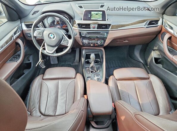 WBXHT3C39J5L34942 2018 BMW X1 White Вид панелі приладів