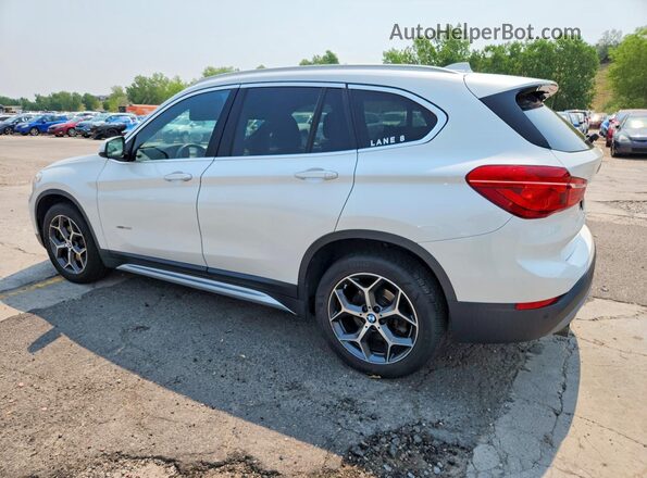 WBXHT3C3XG5E50971 2016 BMW X1 White Rear left