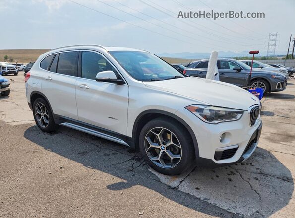 WBXHT3C3XG5E50971 2016 BMW X1 White Front right