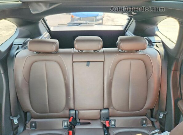 WBXHT3C3XG5E50971 2016 BMW X1 White Rear seats view