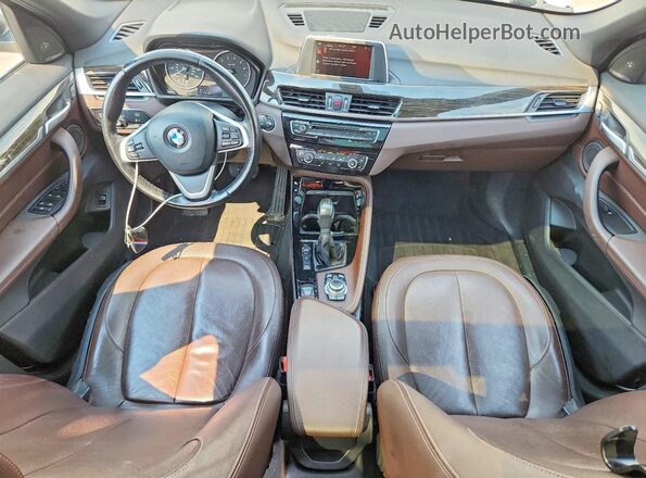 WBXHT3C3XG5E50971 2016 BMW X1 White Dashboard view
