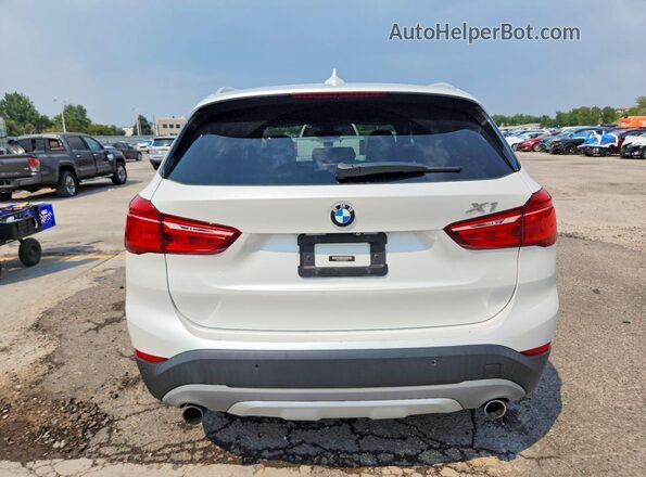 WBXHT3C3XG5E50971 2016 BMW X1 White Rear view
