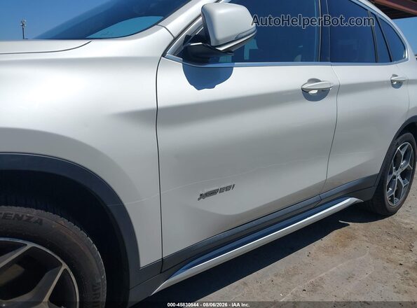WBXHT3C3XG5F65571 2016 BMW X1 White Front view