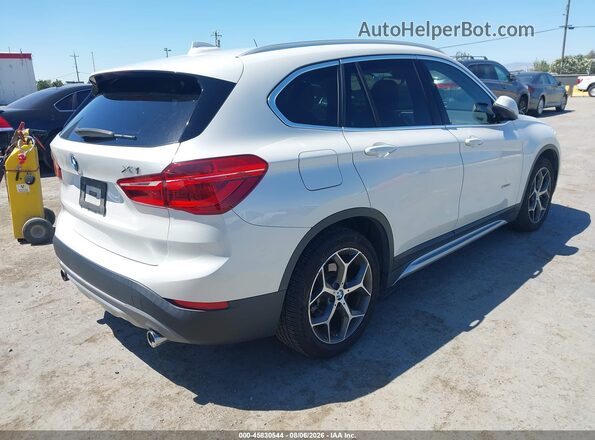 WBXHT3C3XG5F65571 2016 BMW X1 White Rear right