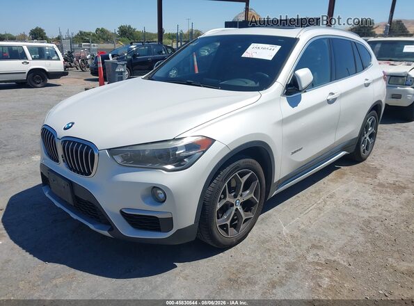 WBXHT3C3XG5F65571 2016 BMW X1 White Front left