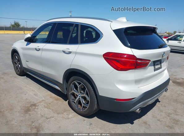 WBXHT3C3XG5F65571 2016 BMW X1 White Rear left