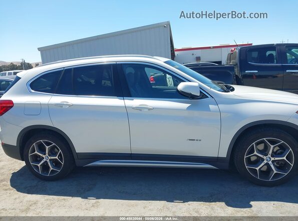 WBXHT3C3XG5F65571 2016 BMW X1 White Rear interior view