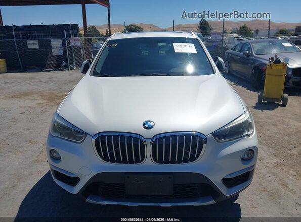 WBXHT3C3XG5F65571 2016 BMW X1 White Instrument cluster view