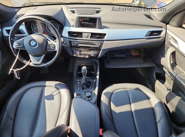 WBXHT3C3XH5F81805 2017 BMW X1 Gray Dashboard view