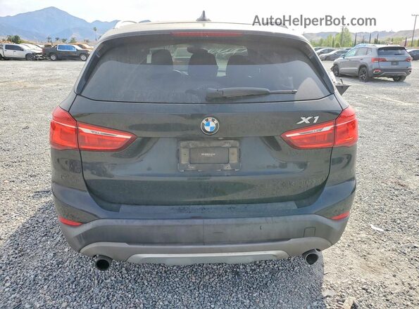 WBXHT3C3XJ5L24548 2018 BMW X1 Black Vista trasera