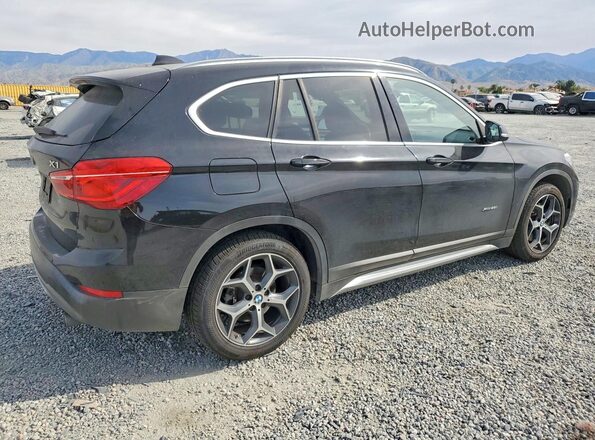 WBXHT3C3XJ5L24548 2018 BMW X1 Black Trasero derecho