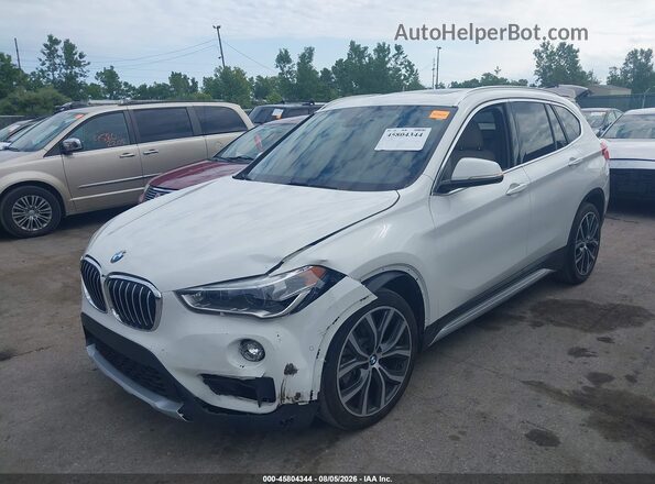 WBXHT3C52K3H35153 2019 BMW X1 White Vista tres cuartos delantera izquierda