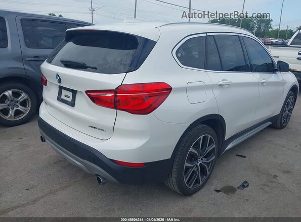 WBXHT3C52K3H35153 2019 BMW X1 White Trasero derecho