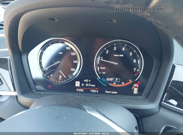 WBXHT3C53K5L89647 2019 BMW X1 Orange Vista de los asientos traseros