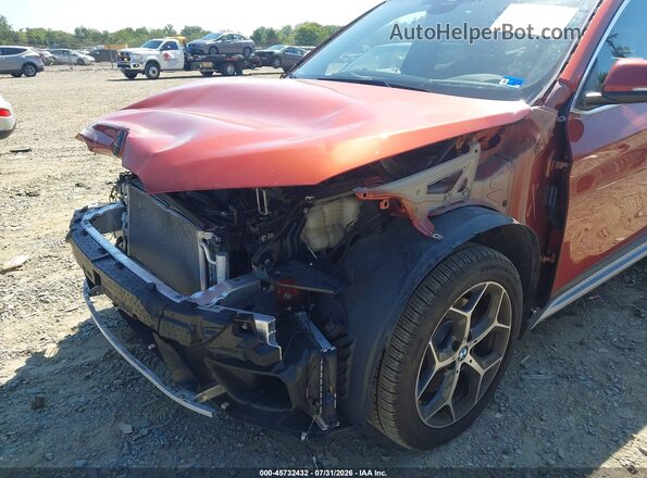 WBXHT3C53K5L89647 2019 BMW X1 Orange Vista frontal