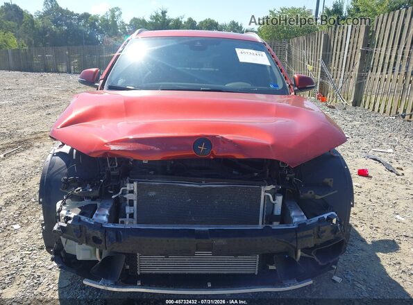 WBXHT3C53K5L89647 2019 BMW X1 Orange Vista interior trasera