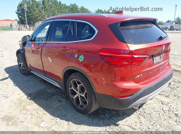 WBXHT3C53K5L89647 2019 BMW X1 Orange Trasero izquierdo
