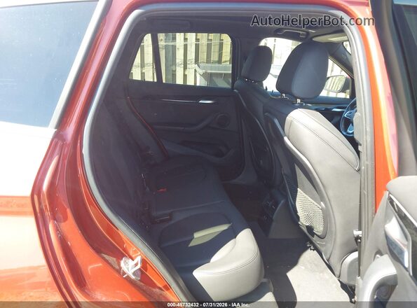 WBXHT3C53K5L89647 2019 BMW X1 Orange Vista de la etiqueta del VIN