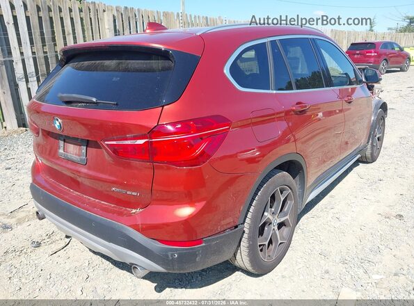 WBXHT3C53K5L89647 2019 BMW X1 Orange Trasero derecho