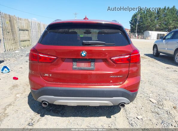 WBXHT3C53K5L89647 2019 BMW X1 Orange 