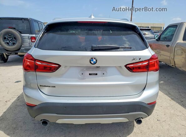 WBXHT3Z30G4A50785 2016 BMW X1 Silver Rear view