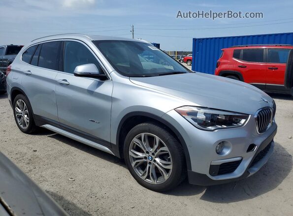 WBXHT3Z30G4A50785 2016 BMW X1 Silver Front right