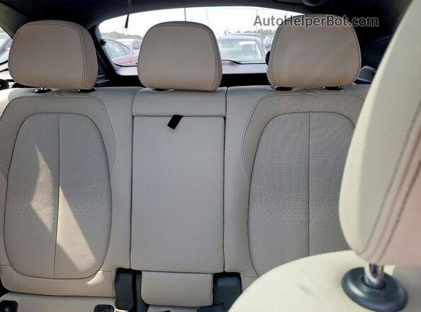 WBXHT3Z30G4A50785 2016 BMW X1 Silver Rear seats view