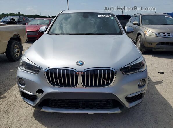 WBXHT3Z30G4A50785 2016 BMW X1 Silver Front view