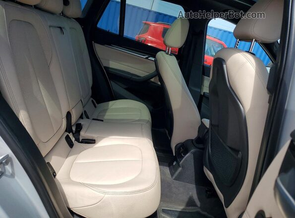 WBXHT3Z30G4A50785 2016 BMW X1 Silver Rear interior view