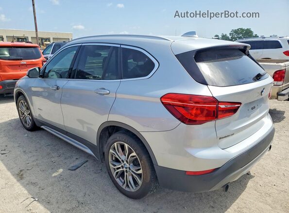 WBXHT3Z30G4A50785 2016 BMW X1 Silver Rear left