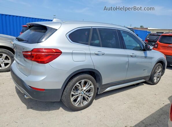 WBXHT3Z30G4A50785 2016 BMW X1 Silver Rear right