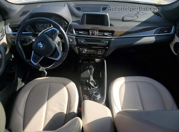 WBXHT3Z30G4A50785 2016 BMW X1 Silver Dashboard view
