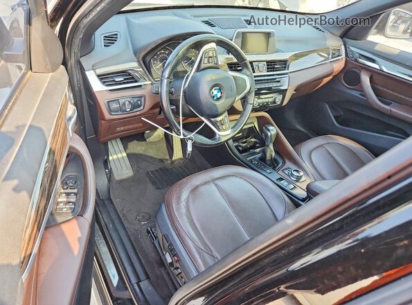 WBXHT3Z30H4A53655 2017 BMW X1 Черный Вид панели приборов