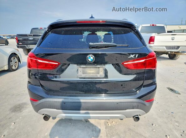 WBXHT3Z30H4A53655 2017 BMW X1 Черный Вид сзади