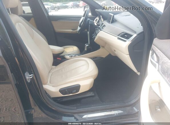 WBXHT3Z30H4A65109 2017 BMW X1 Black Front interior view