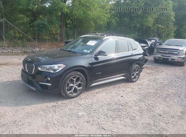 WBXHT3Z30H4A65109 2017 BMW X1 Black Front left