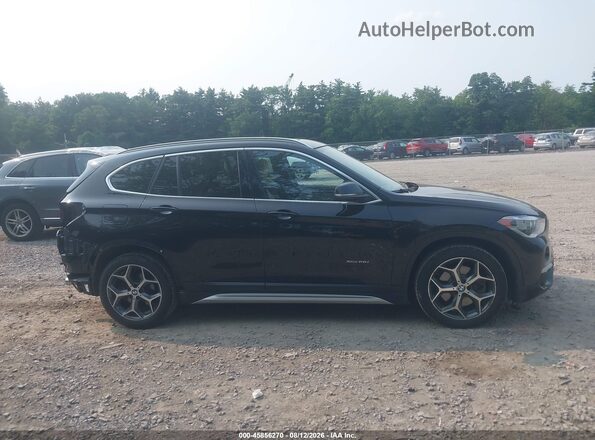WBXHT3Z30H4A65109 2017 BMW X1 Black Rear interior view