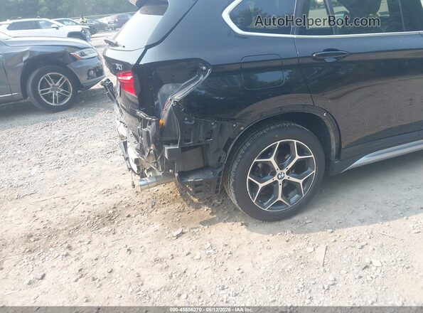 WBXHT3Z30H4A65109 2017 BMW X1 Black Front view