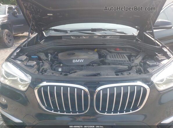 WBXHT3Z30H4A65109 2017 BMW X1 Black Rear view