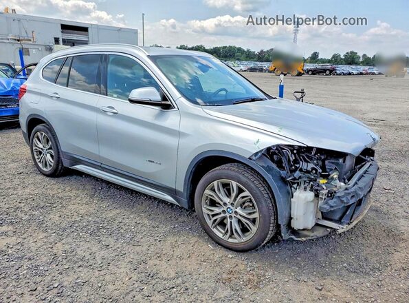 WBXHT3Z31H4A57942 2017 BMW X1 Серебряный Передняя правая четверть