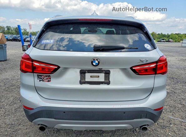 WBXHT3Z31H4A57942 2017 BMW X1 Серебряный Вид сзади