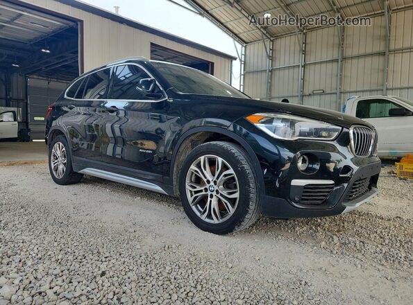WBXHT3Z34H4A55165 2017 BMW X1 Black Front right