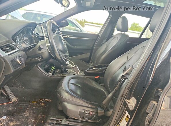 WBXHT3Z34H4A55165 2017 BMW X1 Black Front interior view