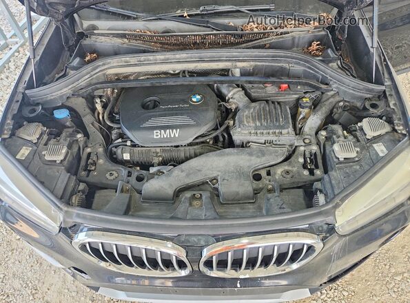 WBXHT3Z34H4A55165 2017 BMW X1 Black Engine compartment view