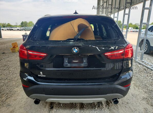 WBXHT3Z34H4A55165 2017 BMW X1 Black Rear view