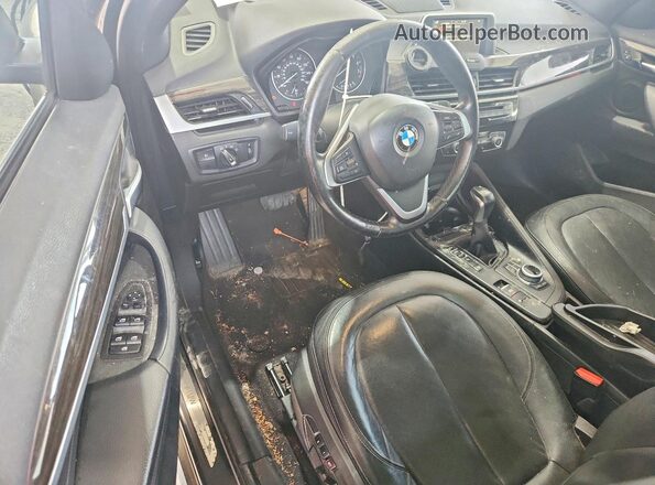 WBXHT3Z34H4A55165 2017 BMW X1 Black Dashboard view