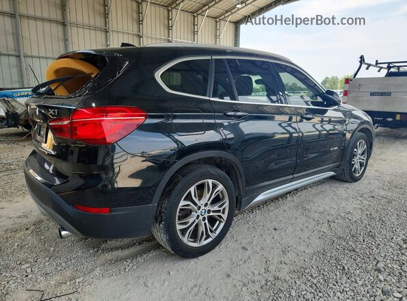 WBXHT3Z34H4A55165 2017 BMW X1 Black Rear right