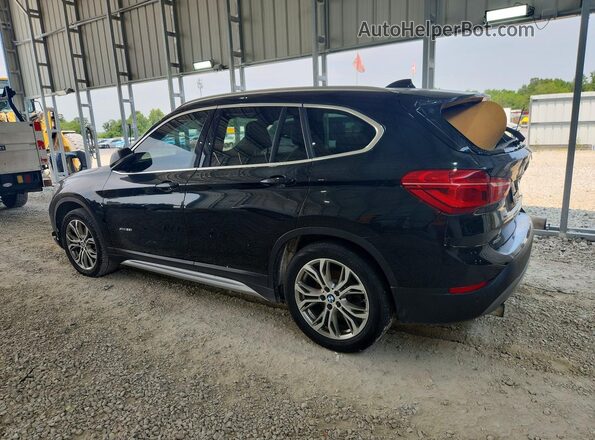 WBXHT3Z34H4A55165 2017 BMW X1 Black Rear left