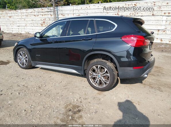WBXHT3Z34H4A64951 2017 BMW X1 Black Rear left